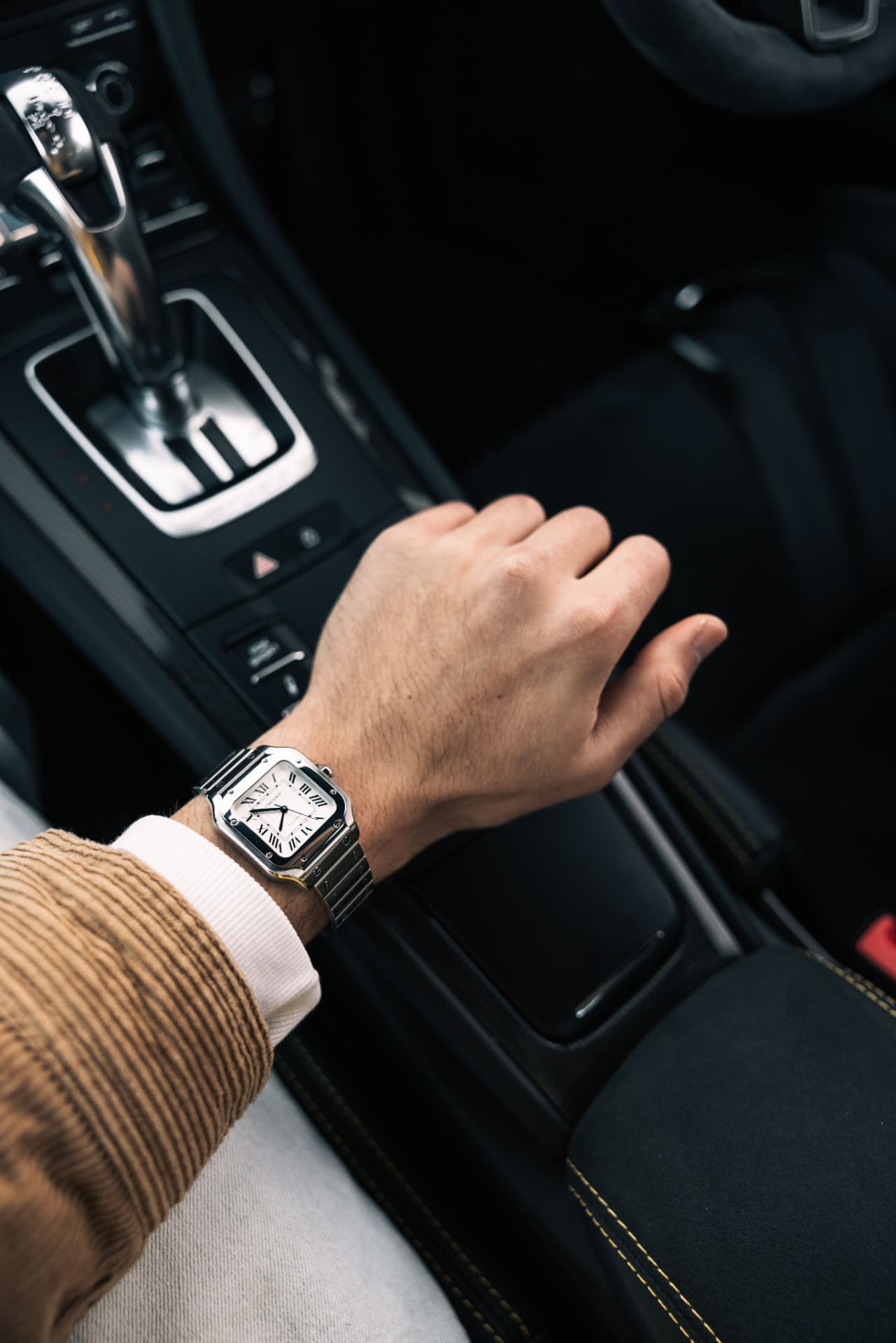 Vintage explorer-style wristwatch worn on a wrist